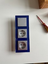 Merten 3-fach Rahmen mit Schalter und Schuko