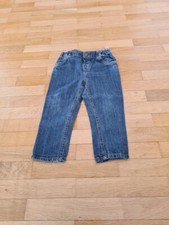 Blaue Jeans von C&A mit Mickey Mouse Logo an der Rückseite in Größe 86