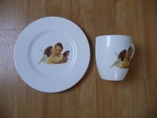 Das Depot Kaffeebecher und Dessertteller weiß mit Putten