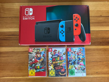 Nintendo Switch Spielkonsole - Neon-Rot/Neon-Blau mit Spiele Bundle