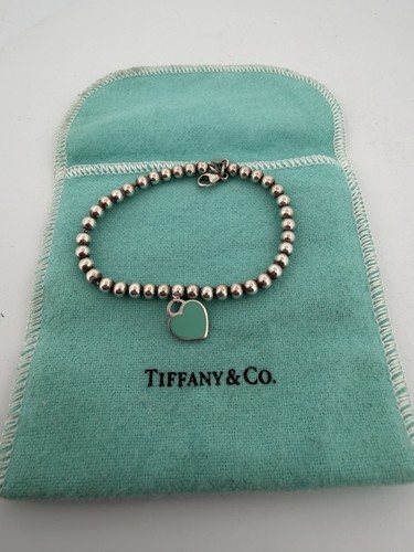 Please return tiffany co - to,