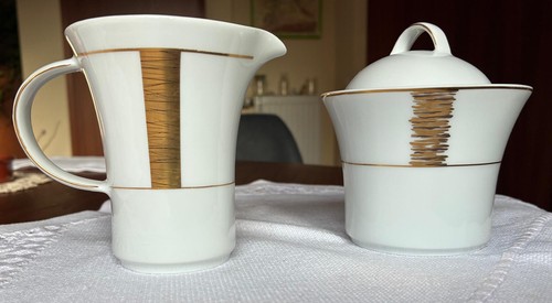 Milchkännchen und zuckerdose - und,