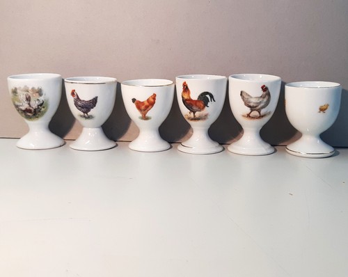 Antique egg cups with - 6,