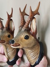 Hirschköpfe geschnitzt Holz