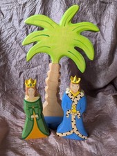 Holztiger König und Königin mit Palme