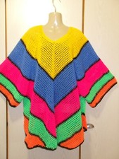  Poncho , (geschlossen), bunt