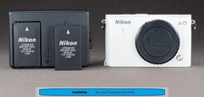 Nikon 1 J3 im akzeptablem Zustand 6.900 Auslösungen Farbe Weiß