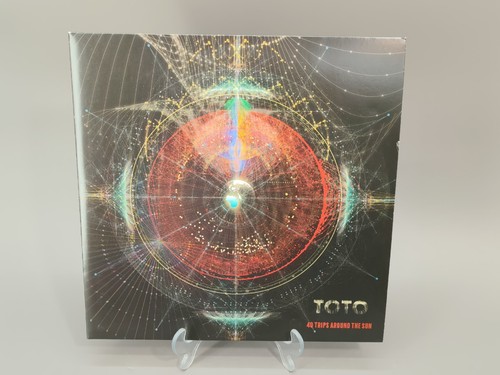 Toto trips around - toto,