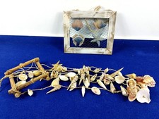 Maritimes Windspiel aus Muscheln und Bilderrahmen