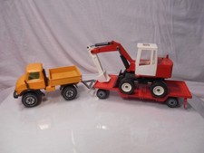 SIKU Unimog mit 2680 Trailer und 2185 Bagger
