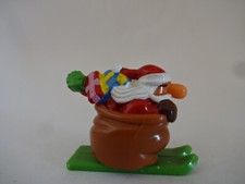 Weihnachtsfigur / Weihnachtsmann auf Ski mit Sack auf Rücken