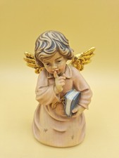 GLOCKENENGEL AUS HOLZ MIT BUCH