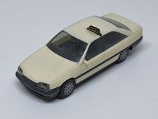 Opel Omega Taxi  von Herpa