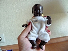 Kleine Schildkröt Baby-Puppe mit schwarzer Haut 16 cm