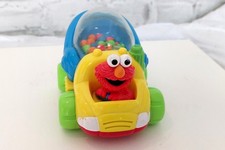 TYCO Elmo-Spielzeugauto aus der Sesamstraße + "Das zweite Samson Schnuffelbuch"