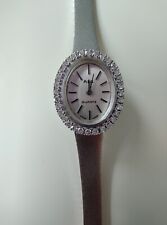 35/36 Diamanten ALG/Quartz/Swiss made Weiß Gold 585