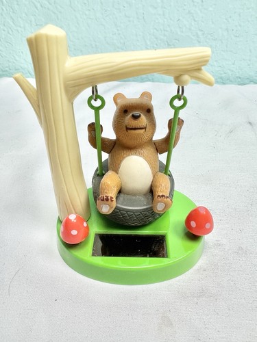 Solar dancers swinging bear - bear, on