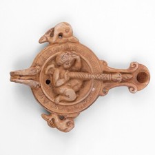 Antike Öllampe mit Eros -