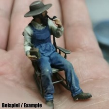 Farmer mit Schaukelstuhl