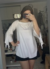 Weiße Bluse mit Weiten