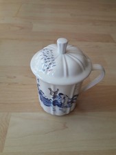 Teetasse mit Sieb und Deckel