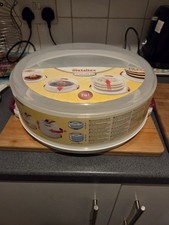 Metaltex verstellbarer Kuchenträger - Backzubehör und Aufbewahrung - weiß/rosa,