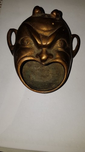 Alte fratze aus bronze - fratze,