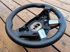 NEW LEATHER STEERING WHEEL