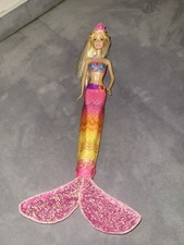Barbie Das Geheimnis von Oceana Merliah mit Surfbrett Meerjungfrau Verwandlung