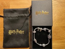 HARRY POTTER ARMBAND 7 CHARMS