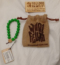 Armband mit grünen Kugeln von