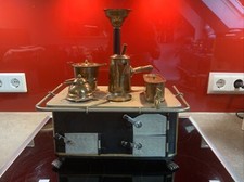 Spielzeugherd mit Kupfertöpfen Antik