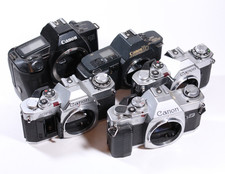 Konvolut mit 5 Canon Kameras, AV-1, AL-1, T70, EOS 650, defekt für Bastler