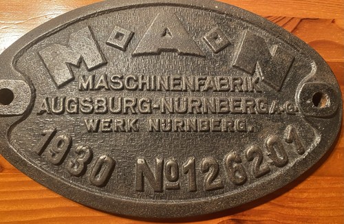Man firmenschild - man,