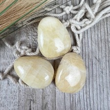 Orangen Calcit Trommelstein