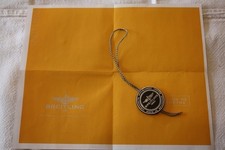 BREITLING UHRENANHÄNGER IN SCHWARZ EINER AVENGER BLACKBIRD 44