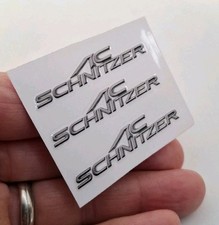3 X Schnitzer Schriftzug Logo