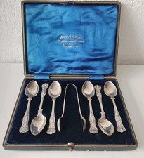 Kaffeelöffel und Zuckerzange