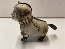 Blechkatze mit Uhrwerk und