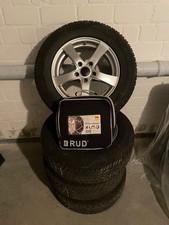 Autowinterreifen auf Alufelgen inclusive Schneeketten