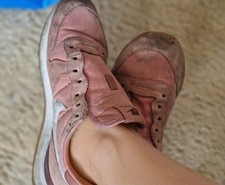 Stark getragene Nike Sneaker