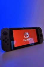 Nintendo Switch Black-Edition (Grau) -  Zelda Botw & Schlag den Star 2