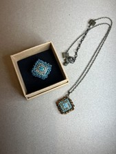 Konplott. Ring und Kette