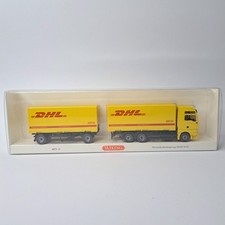 Wiking 1:87, MAN TGX, Wechselkofferhängerzug, " DHL ", nr. 057310, mit OVP.