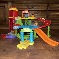 KOMPLETTES SET Vtech Tut Tut Baby Flitzer Parkgarage + Fahrzeug Abschleppwagen