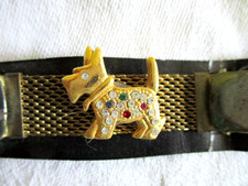 Jackenraffer Hund gold mit Straßsteinen Blusenraffer