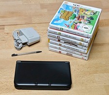 Nintendo 3DS XL Schwarz mit Spielepaket kleine Bruchstelle unter R Taste