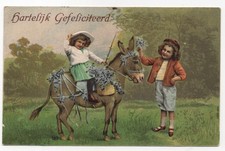 AK Kinder, Prägekarte, Mädchen mit Blumenkorb auf Esel, Junge mit Blumen