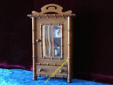 Puppenkleiderschrank,   Holz in Bambusoptik, um 1900 - 1910