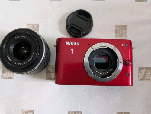 Nikon und zoom 10 - j1,